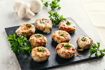 baked mushrooms stuffed with cheese - 94868412