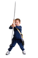 Happy 3 years old boy, holding a handmade bow with an arrow and