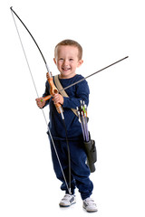 Happy 3 years old boy, holding a handmade bow with an arrow and