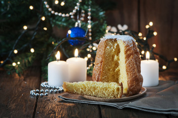 Christmas cake panetone on the wooden table