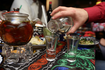 Man pouring vodka
