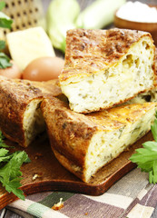 Zucchini pie with cheese and herbs