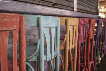 colorful wooden chairs