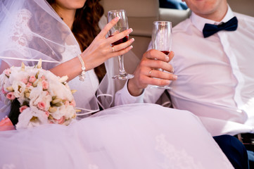wedding rings and bouquet