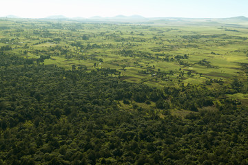 Aerials of Lewa Conservancy showing fence line of protected areas and encroaching farming in Kenya, Africa