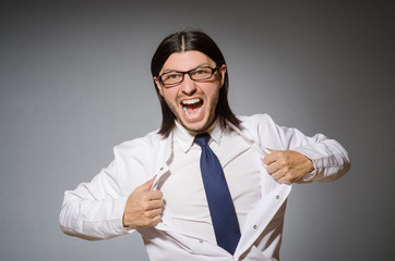 Male doctor against gray