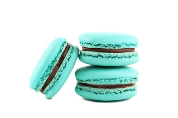 Tasty blue macarons isolated on white