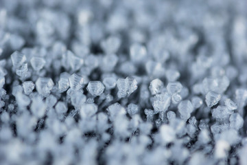 The small tiny ice columns and spikes macro shot