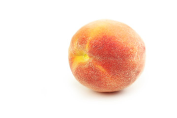 Ripe peach fruit isolated on a white