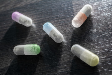 Macro Of 5 Colored Medicine Capsules