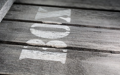 Side Macro Of Wood Panels With A BOX Logo