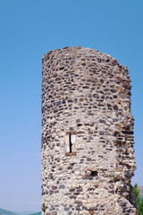 Naklejka premium Medieval stone tower located in Saint-Vincent-de-Barres in France.