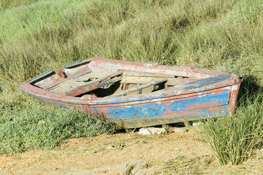 Old blue row boat on land at Palos de la Frontera - La R‡bida, the Huelva Provence of Andalucia and Southern Spain, the site where Columbus departed from the Old World to the New World in August 3 of 1492