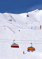 Skiers and chairlift in Solden, Austria