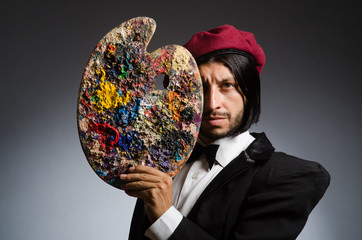 Fototapeta premium Funny artist working in the studio