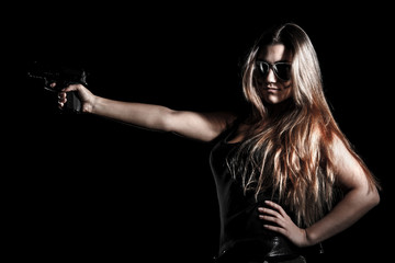 Military woman with a gun