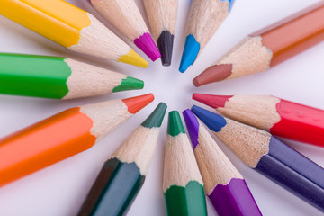 Fototapeta premium Many different colored pencils on white background