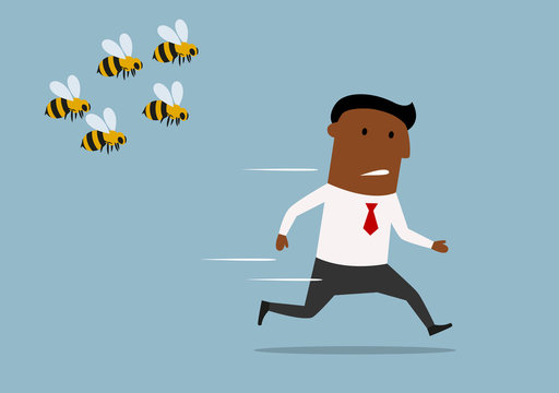 Cartoon businessman running away from bees