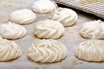 Fototapeta na wymiar White meringue in a bakery