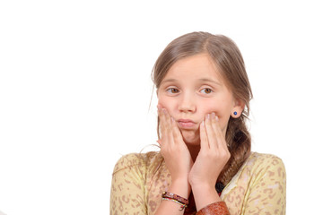 Beautiful little girl with a toothache