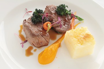 beef lamb steak plated meal