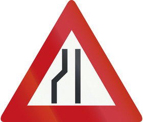 Netherlands road sign J19 - Road narrows on the left side