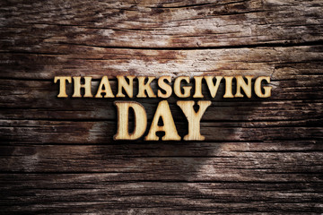 Fototapeta premium Thanksgiving Day. Words on old wooden board.