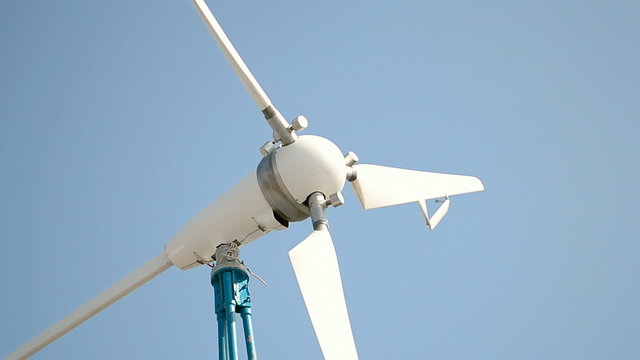 windmill rotated under strong wind on blue sky in sunny day, green energy generator, modern electricity generation, technology diversity