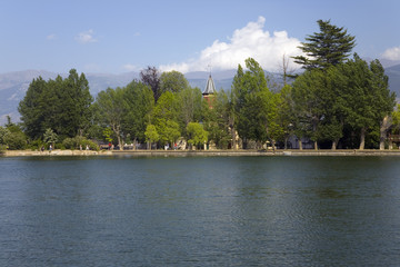 Small town of Puigcerda, Girona, Cataluna, Spain, Europe with view of boating lake near French border in Pyrenees Mountains