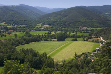 Green valley view of La Seu d'Urgell, (Sa Seu d'Urgell) in Catalunya, Spain, Europe, in Pyrenees Mountains