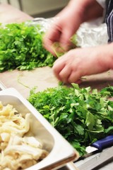 chef chopping parsley