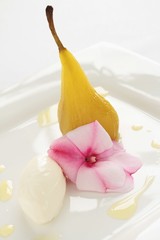 plated poached pear dessert