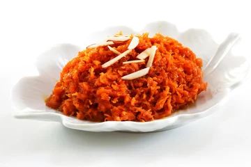 Meubelstickers Carrot Halwa with almond slivers - Indian Sweet dessert  © vm2002