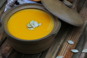 pumpkin Soup on a wooden background