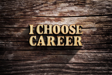 Fototapeta premium I choose career. Words on old wooden board.