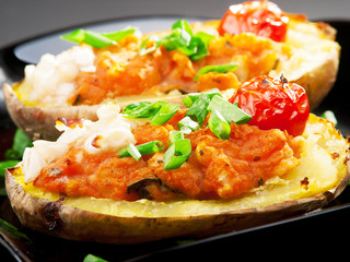 Stuffed potatos with tomatos