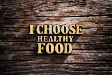 Fototapeta premium I choose Healthy Food. Words on old wooden board.