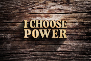Fototapeta premium I choose Power. Words on old wooden board.