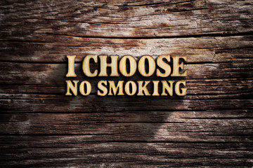 I choose No Smoking. Words on old wooden board.