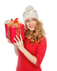 Happy young woman hold red Christmas wrapped gift present smilin