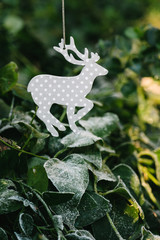 reindeer ornament with frosty leaves