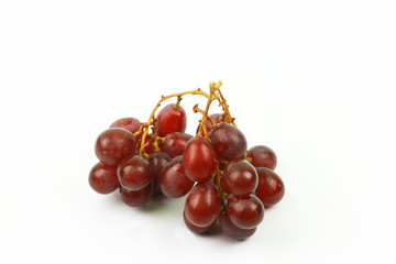 Red grapes isolated on white background