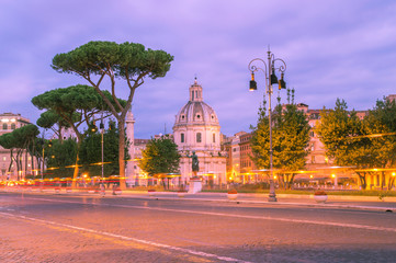 Artistic edit of Rome at dawn, Roman forum, statue of Ceasar and a church