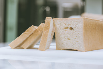 The cut loaf of bread.White toast.