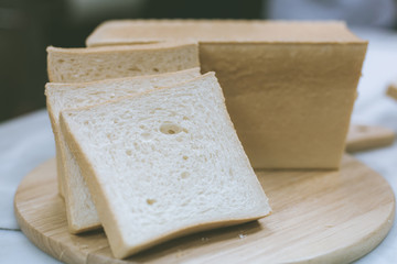 The cut loaf of bread.White toast.