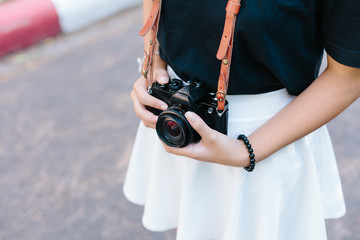 girl with vintage film camera
