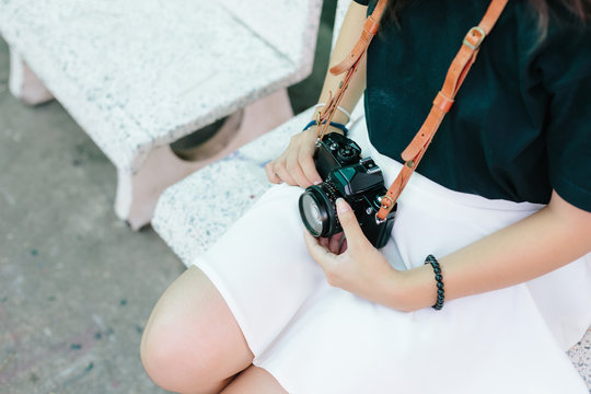 girl with vintage film camera