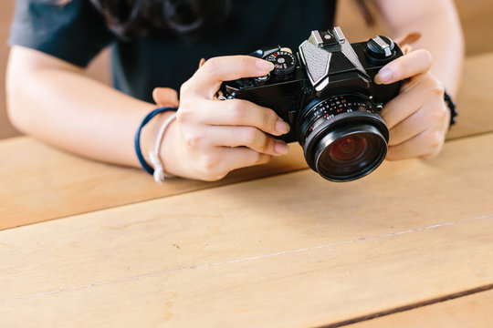 girl with vintage film camera