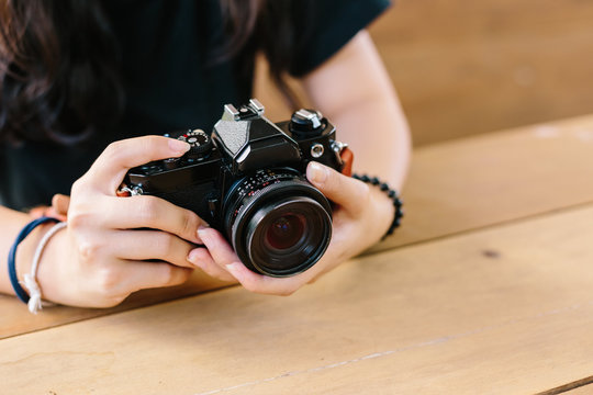 girl with vintage film camera