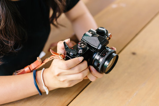 girl with vintage film camera